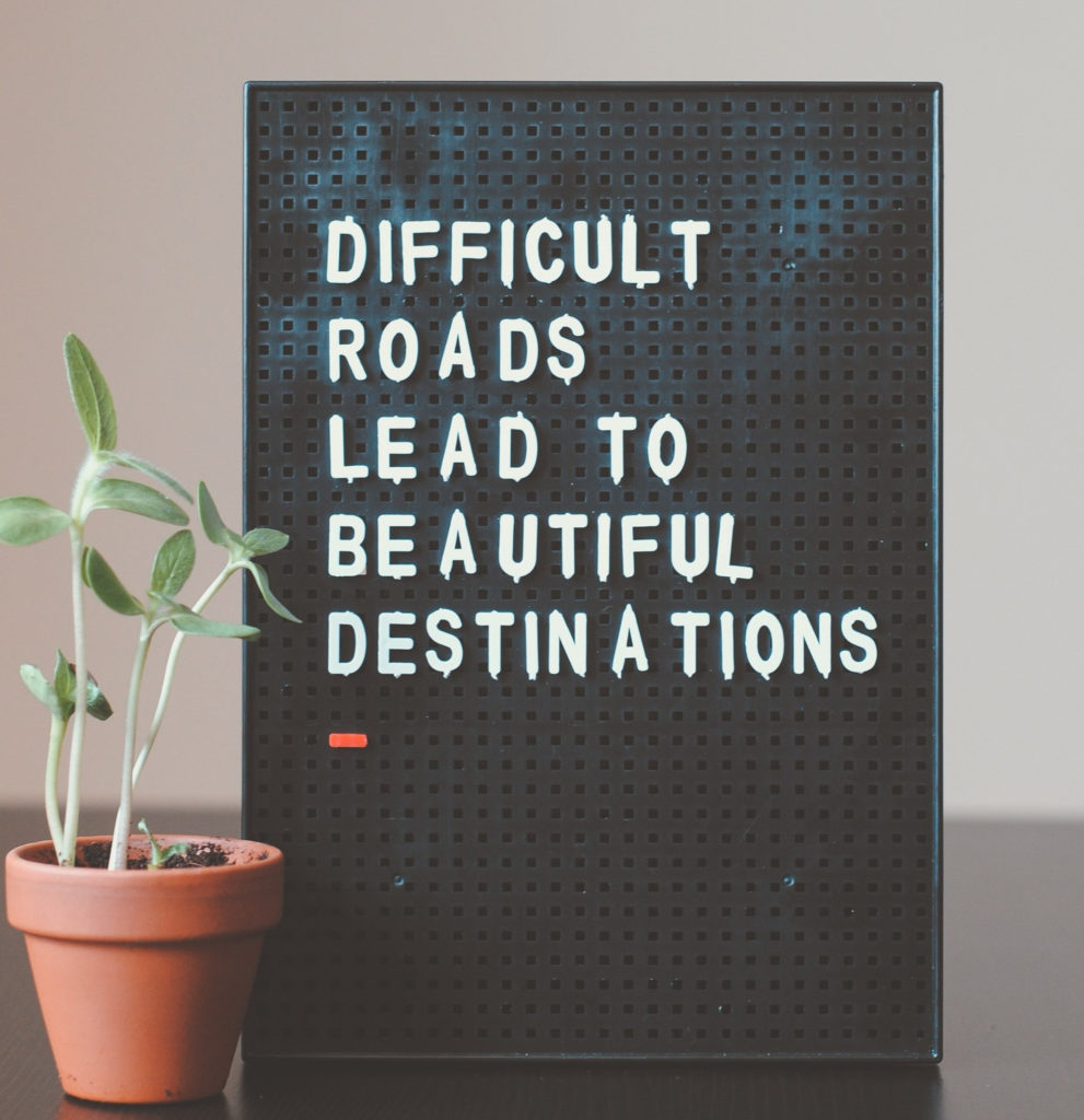 difficult roads lead to beautiful destinations sign